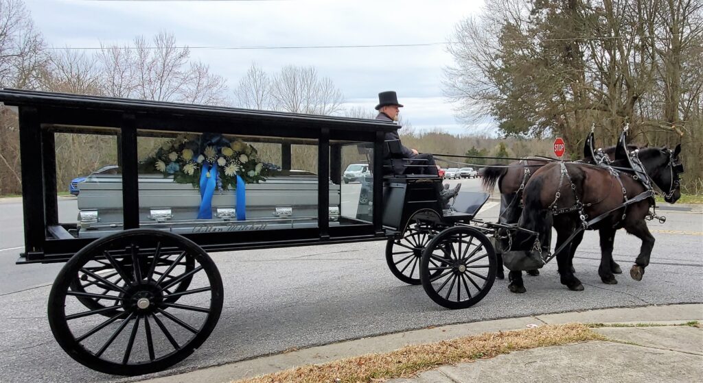 black-2-horse-funeral-carraige-antique--1024x559.jpg